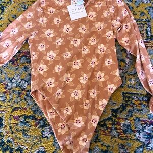 Lokahi Floral One Piece - Pink and Tan
Hawaii brand